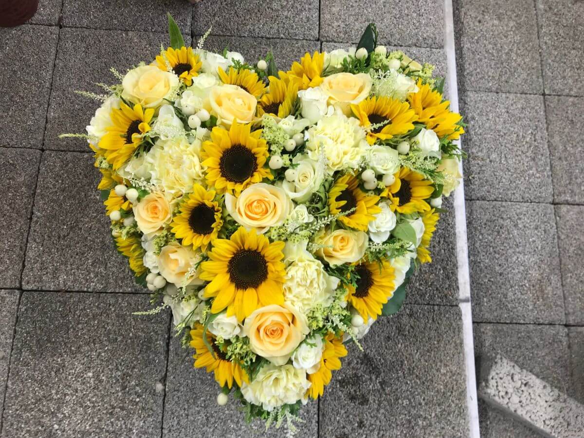 Gärtnerei Egli, Topfpflanzen, Schnittblumen, Unterhalt, Überwinterung Sonnenblumgen-Herz